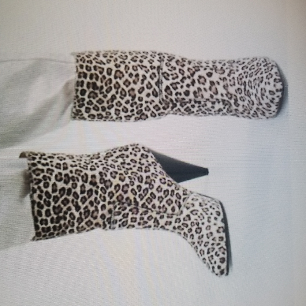 Stuart Weitzman Atomic West Leopard boots.
